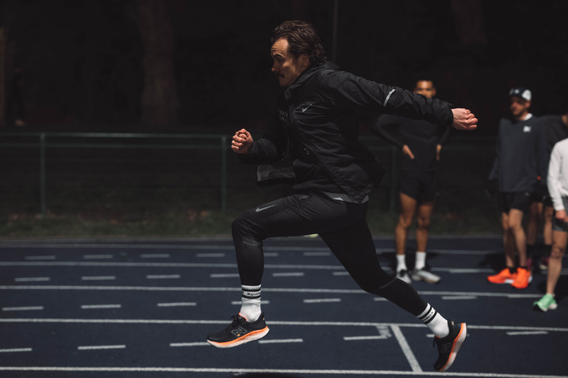 Man running on local track