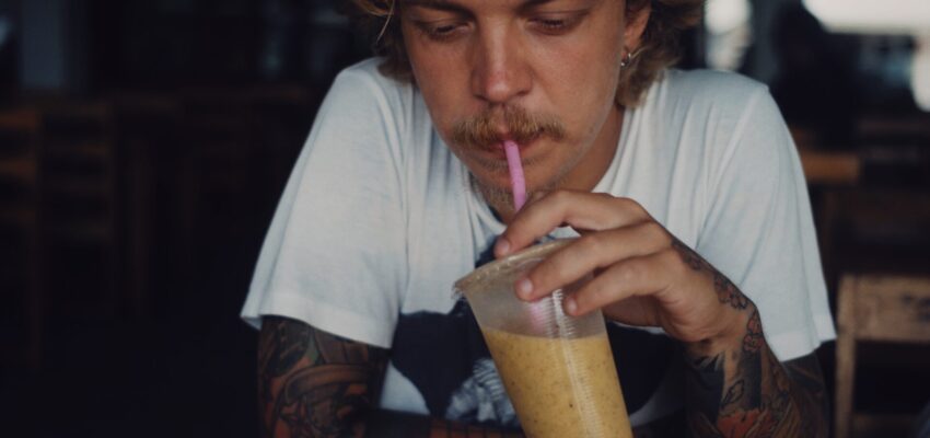 Someone drinking a nutritious smoothie